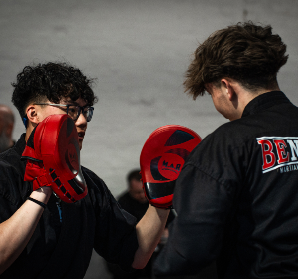 Adult kickboxing pad work at Benefit Martial Arts Academy